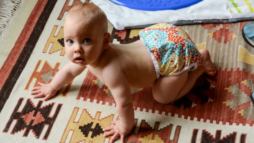 How do you fold a prefold Diaper for an infant boy?
